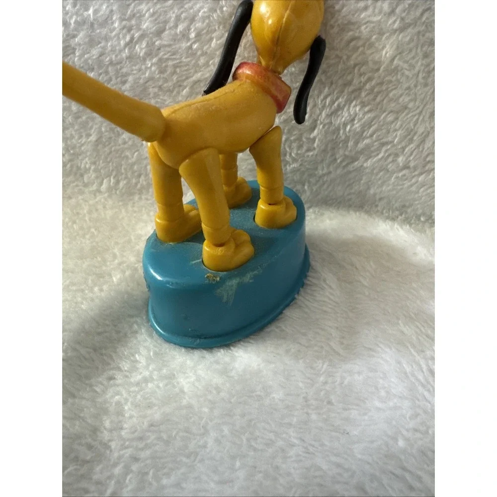 Gabriel Pluto Push-Up Puppet. Walt Disney Productions/Gabriel‎ Industries, Inc.